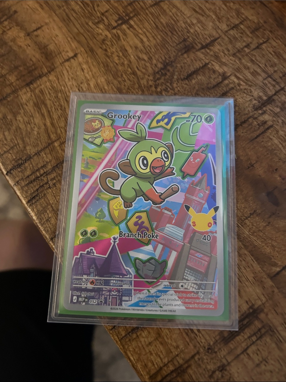 Pokemon Grookey Holographic Card - Green & Pink Accents